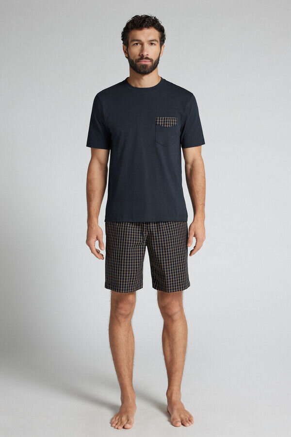 Blå och krämfärgad kort pyjamas i tyg och bomull med rutmönster Blå och krämfärgad kort pyjamas i tyg och bomull med rutmönster