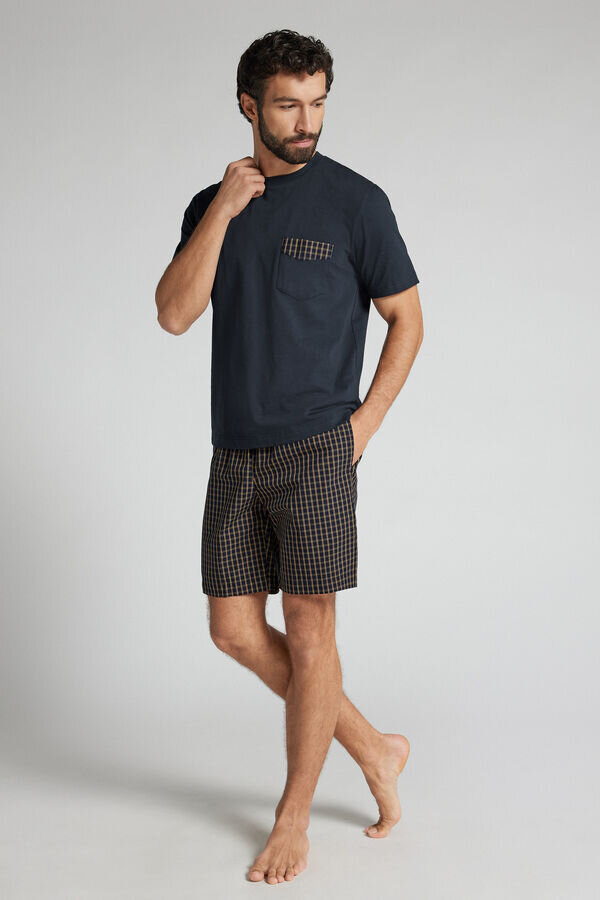Blå och krämfärgad kort pyjamas i tyg och bomull med rutmönster Blå och krämfärgad kort pyjamas i tyg och bomull med rutmönster